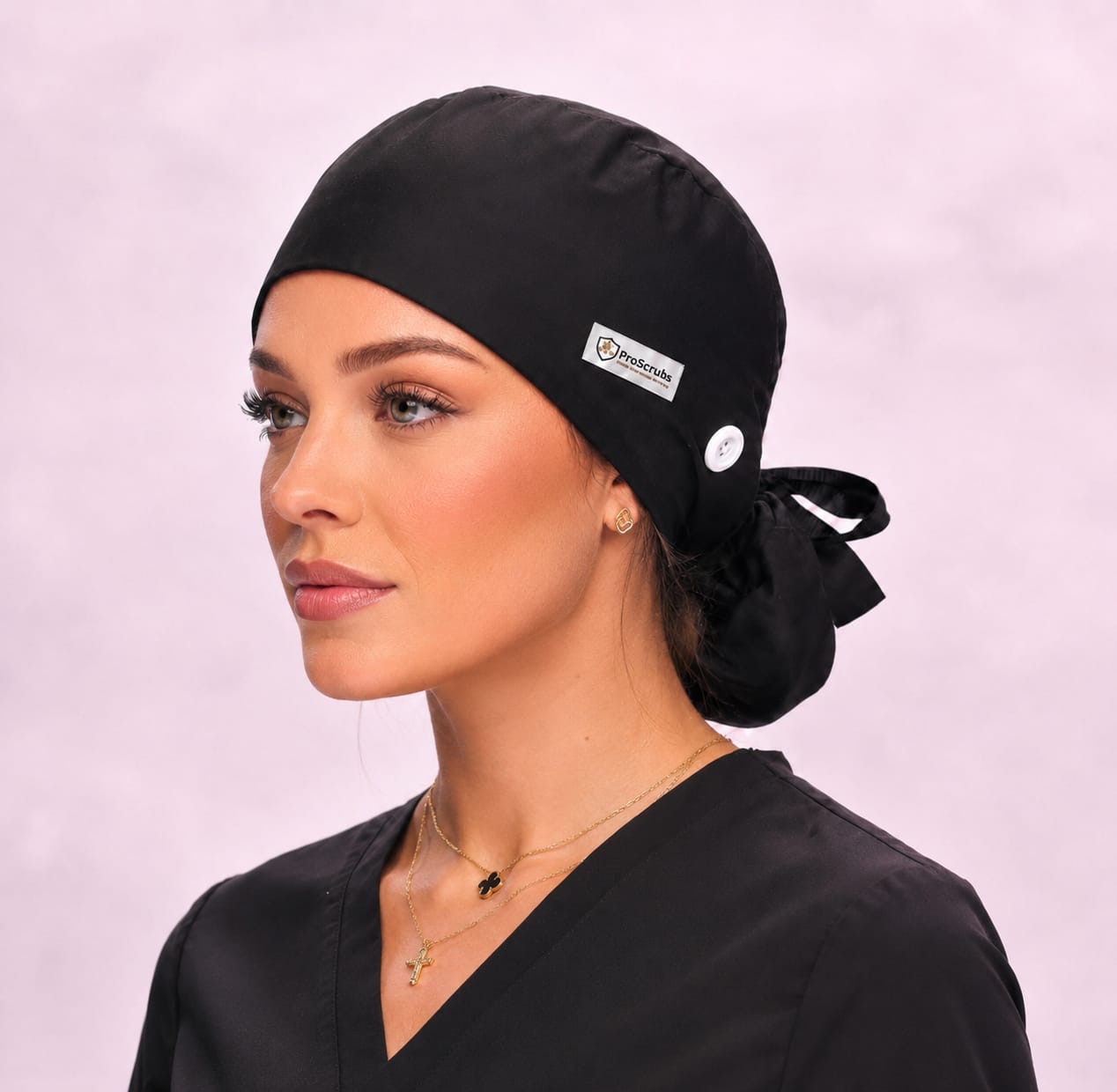 ProScrubs black nursing cap on a model